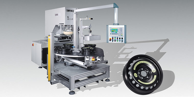 Pad printing machine for printing spare car wheels