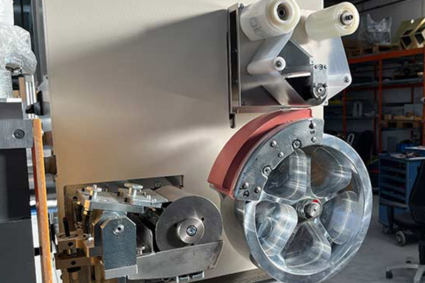 Detail view of a rotary printing machine from TAMPONCOLOR
